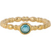Charmin's Gold-Colored Ring with Light Blue Round Stone R1510 &ndash; Playful and Elegant
