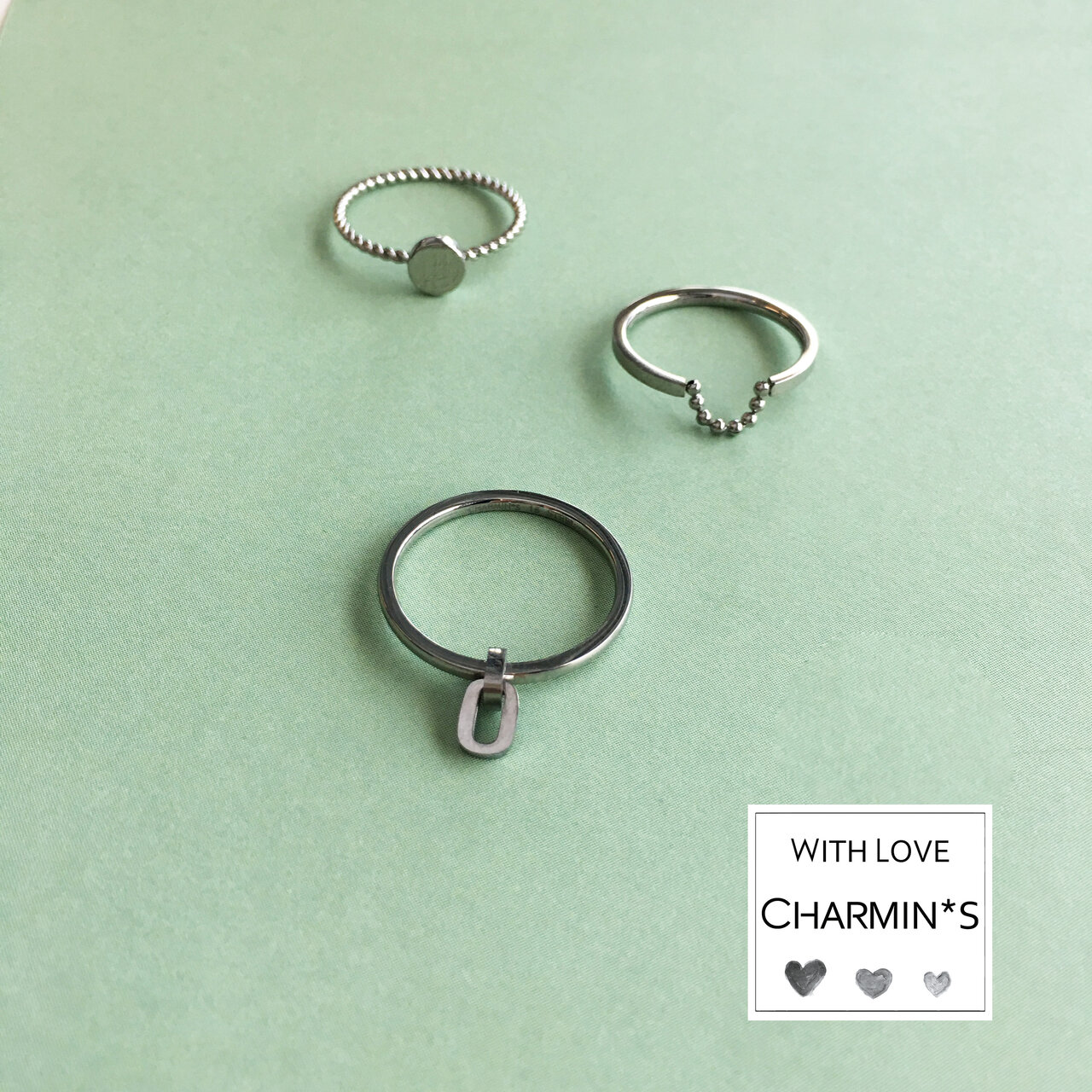 R706 Dangling Oval Shiny steel