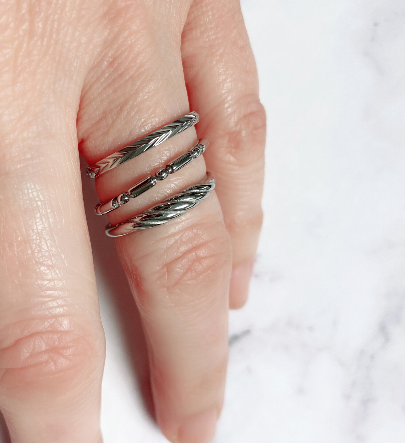 Charmin's Ring Leaves Shiny Staal R1242