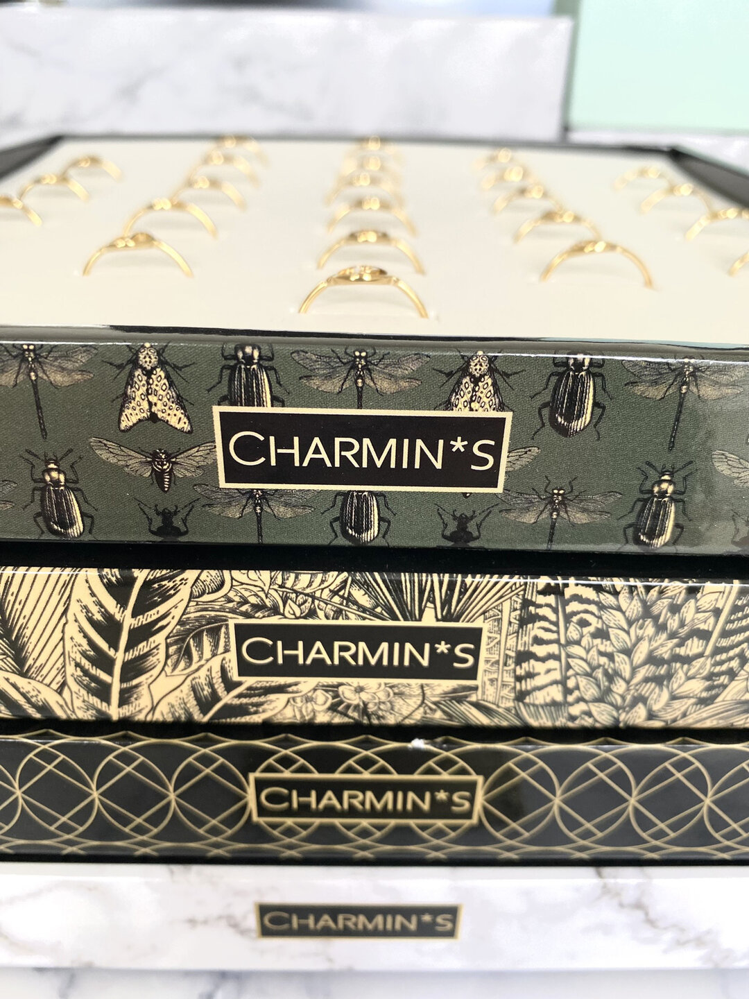 Charmin's Easy Order round Intials Rings with display, rings in 4 sizes