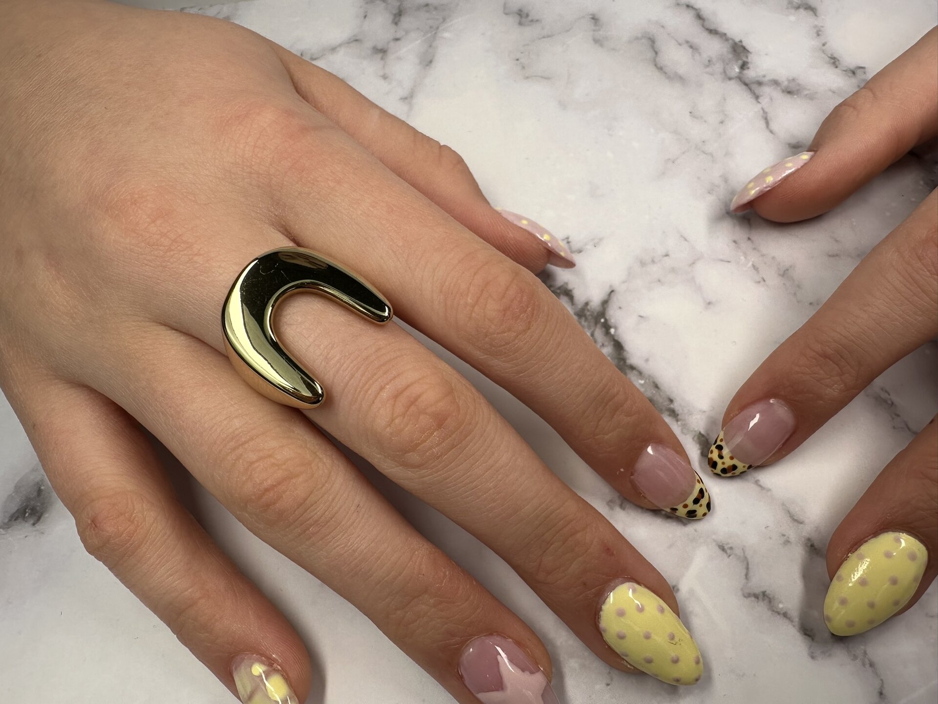 Charmin's Gold-Colored Chunky Ring with an Open U-Shaped Arch Steel R1823 &ndash; Sleek and Modern