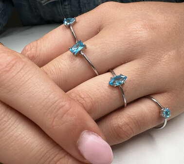 Charmin&#039;s Steel Ring with Elliptical Light Blue Crystal Stone R1679 &ndash; Clear Freshness