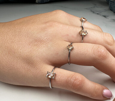 Charmin&#039;s Steel Ring with Elliptical Champagne Crystal Stone R1674 &ndash; Warm Shine