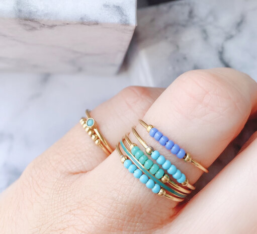 R0986 Anxiety Ring Palm Petrol Blue Beads Goldplated 