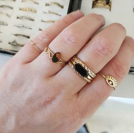 Charmin’s goudkleurige stapelring R525 Dot Twisted goldplated staal