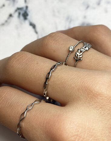 Charmin's Twisted Birthstone ring White Crystal Steel R944
