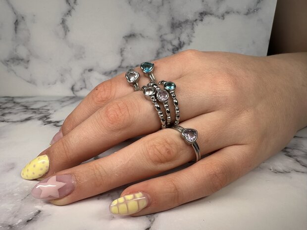 Charmin's Stalen Ring met lichtblauw Rond Steentje R1509 &ndash; Vintage en strak