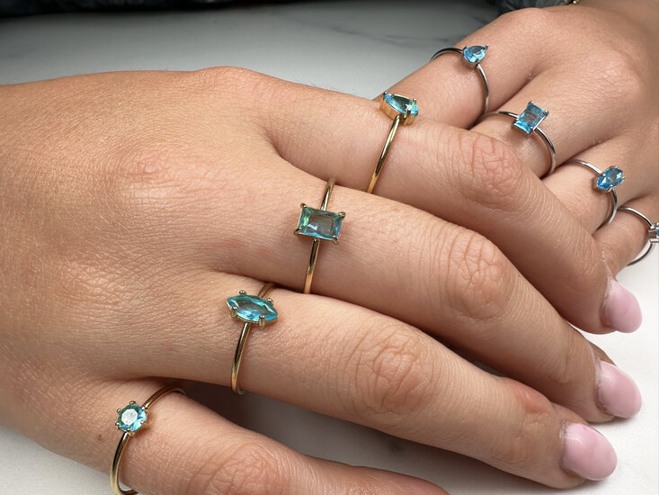 Charmin's Gold-Colored Ring Rectangular Light Blue Stone R1729 – Icy Soft