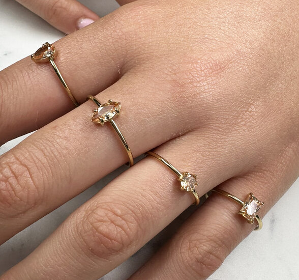 Charmin's Gold-Tone Ring with Elliptical Champagne Crystal R1684– Warm and Elegant